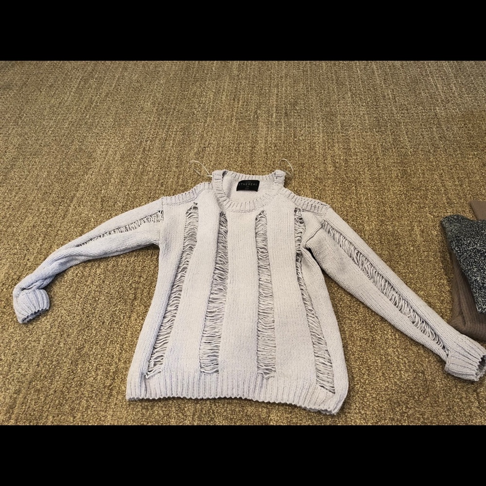 “Etheral” size large sweater shoulder cut out